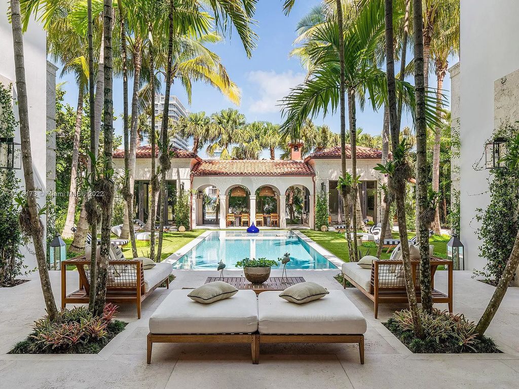 Located in 3541 Flamingo Drive, Miami Beach, Florida. This magnificent, newly constructed Mizner-inspired villa was tastefully designed as a contemporary redux with an unprecedented level of detail, influenced by owner-developer Oren Alexander. Enter the gated porte-cochère through the coach house, which features staff quarters and an A/C 2-car garage.