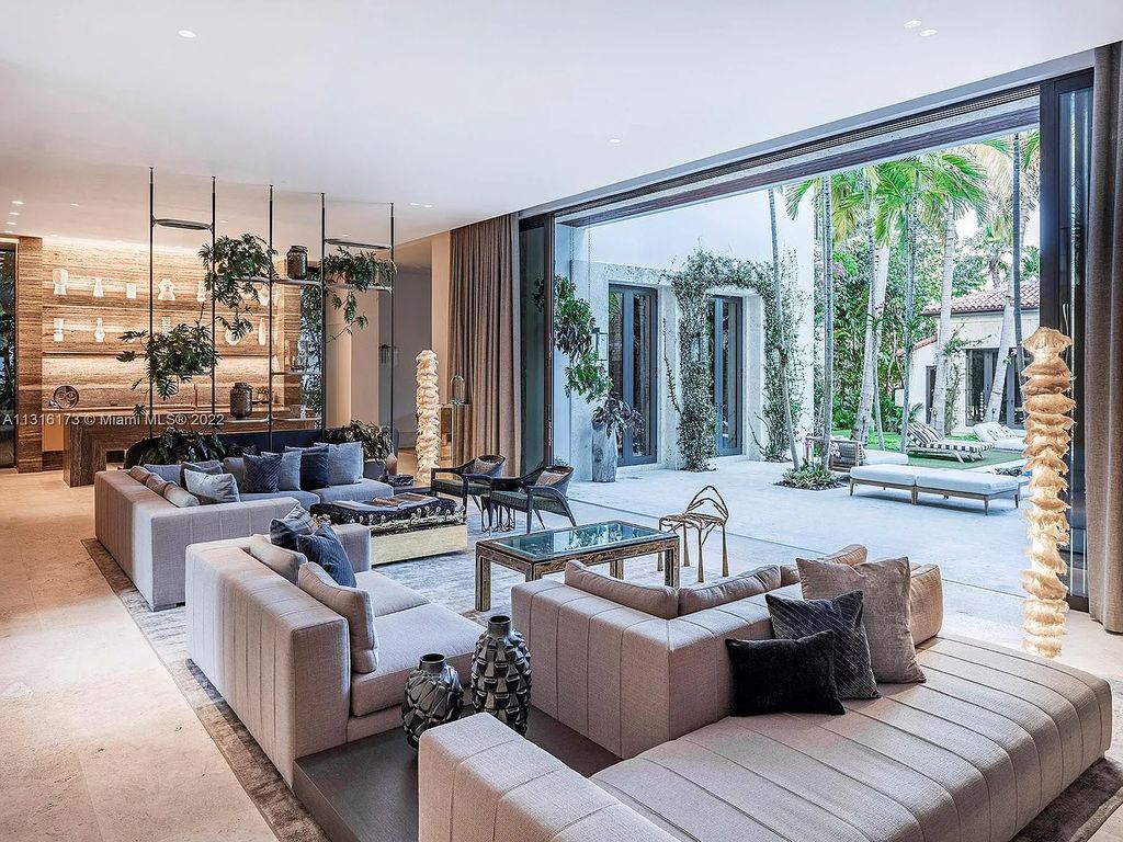 Located in 3541 Flamingo Drive, Miami Beach, Florida. This magnificent, newly constructed Mizner-inspired villa was tastefully designed as a contemporary redux with an unprecedented level of detail, influenced by owner-developer Oren Alexander. Enter the gated porte-cochère through the coach house, which features staff quarters and an A/C 2-car garage.