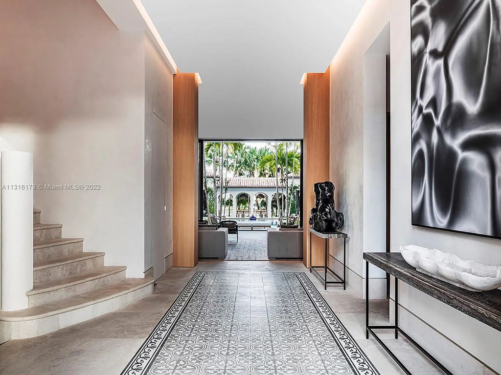 Located in 3541 Flamingo Drive, Miami Beach, Florida. This magnificent, newly constructed Mizner-inspired villa was tastefully designed as a contemporary redux with an unprecedented level of detail, influenced by owner-developer Oren Alexander. Enter the gated porte-cochère through the coach house, which features staff quarters and an A/C 2-car garage.