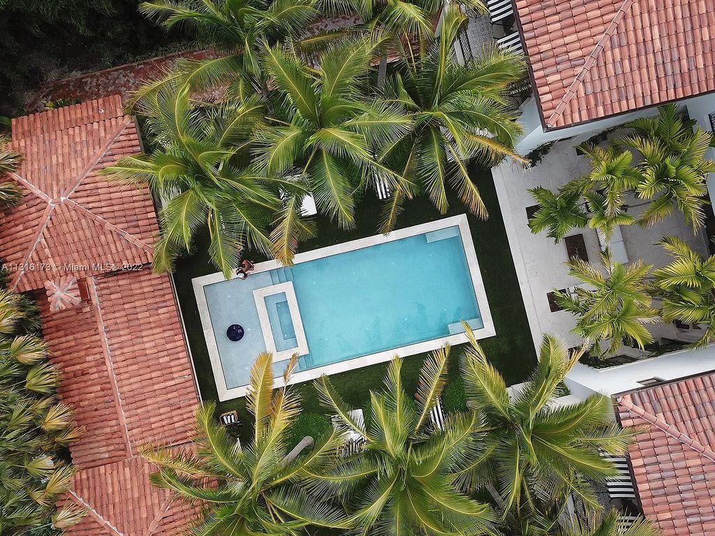 Located in 3541 Flamingo Drive, Miami Beach, Florida. This magnificent, newly constructed Mizner-inspired villa was tastefully designed as a contemporary redux with an unprecedented level of detail, influenced by owner-developer Oren Alexander. Enter the gated porte-cochère through the coach house, which features staff quarters and an A/C 2-car garage.