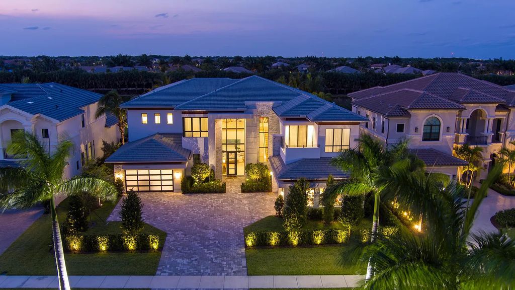 17073 Brulee Breeze Way, Boca Raton, Florida. This Vanderbilt Grand is the largest model offered in Boca Bridges and was constructed by the illustrious GL Homes in 2022. With over 8,179 square feet of luxurious living space, this majestic residence boasts six spacious bedrooms, eight bathrooms, a four-car garage, custom and upgraded accents, a resort-style pool, and an opulent outdoor living area. A fully furnished option is negotiable for this sprawling estate