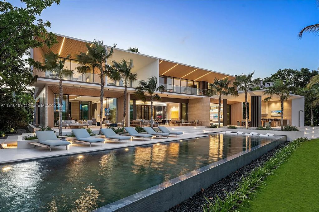 Located at 98 La Gorce Circle, Miami Beach, Florida, the extraordinary Villa Arte by Aquablue Group is situated on the exclusive La Gorce Island. The villa boasts astounding water features and an imposing entrance made of bronze, book-matched travertine, and Japanese white oak. Inside, the interior is unrivaled, featuring finishes in leather, marble, and luxurious wall coverings that have been handcrafted by Italian artisans.