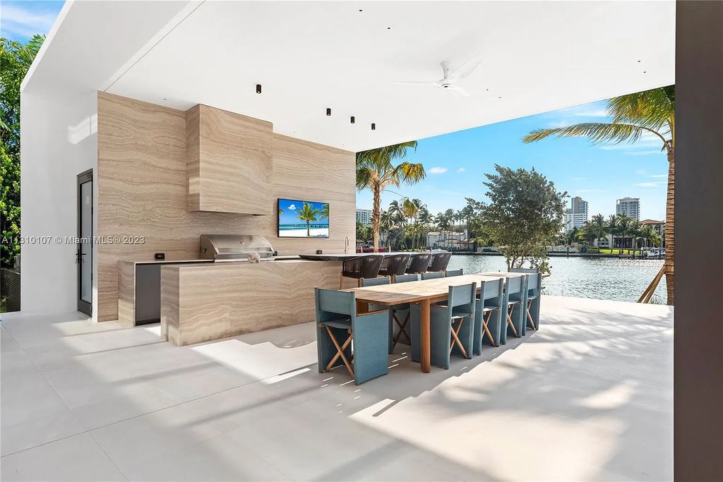 Located at 98 La Gorce Circle, Miami Beach, Florida, the extraordinary Villa Arte by Aquablue Group is situated on the exclusive La Gorce Island. The villa boasts astounding water features and an imposing entrance made of bronze, book-matched travertine, and Japanese white oak. Inside, the interior is unrivaled, featuring finishes in leather, marble, and luxurious wall coverings that have been handcrafted by Italian artisans.