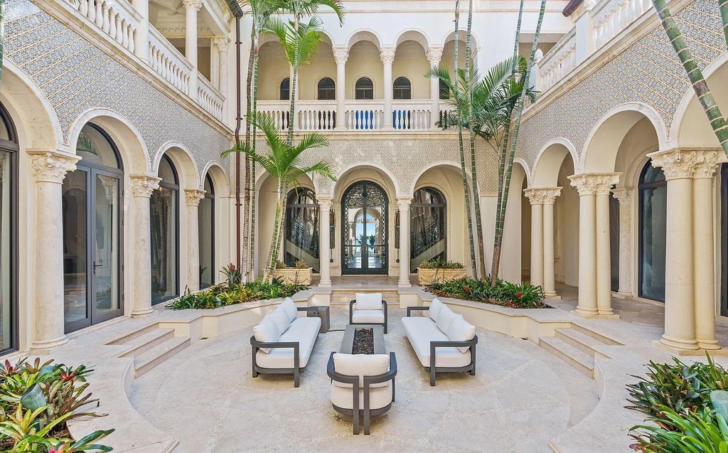 2325 S Ocean Blvd, Delray Beach, FL. A spectacular direct Oceanfront 9BR/13.7BA Estate, custom-built with commanding, unobstructed ocean views. The property boasts gorgeous detailing throughout, featuring palazzo-inspired compound, custom finishes, intricate marblework, and beautiful artisan millwork.