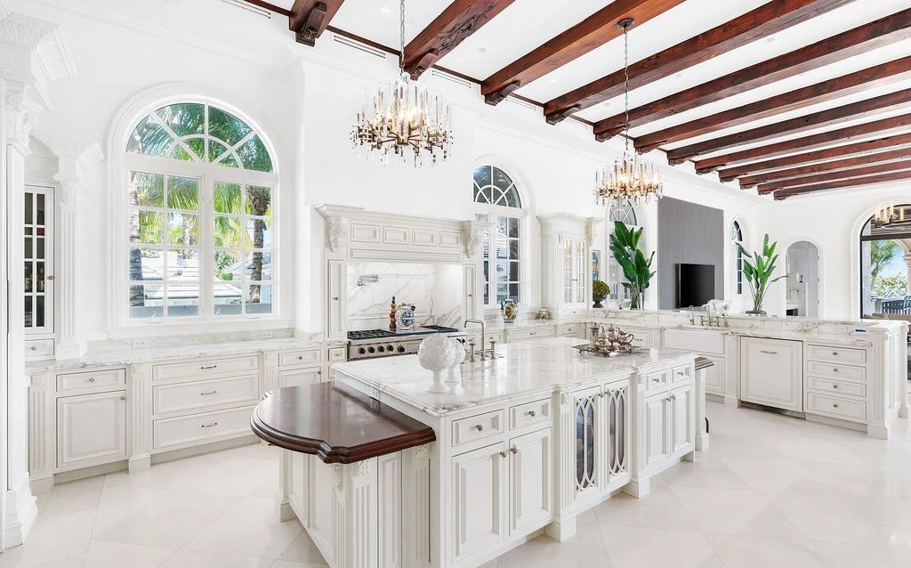 2325 S Ocean Blvd, Delray Beach, FL. A spectacular direct Oceanfront 9BR/13.7BA Estate, custom-built with commanding, unobstructed ocean views. The property boasts gorgeous detailing throughout, featuring palazzo-inspired compound, custom finishes, intricate marblework, and beautiful artisan millwork.