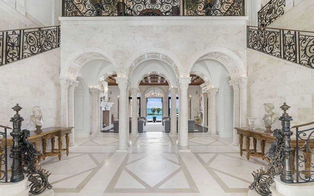 2325 S Ocean Blvd, Delray Beach, FL. A spectacular direct Oceanfront 9BR/13.7BA Estate, custom-built with commanding, unobstructed ocean views. The property boasts gorgeous detailing throughout, featuring palazzo-inspired compound, custom finishes, intricate marblework, and beautiful artisan millwork.