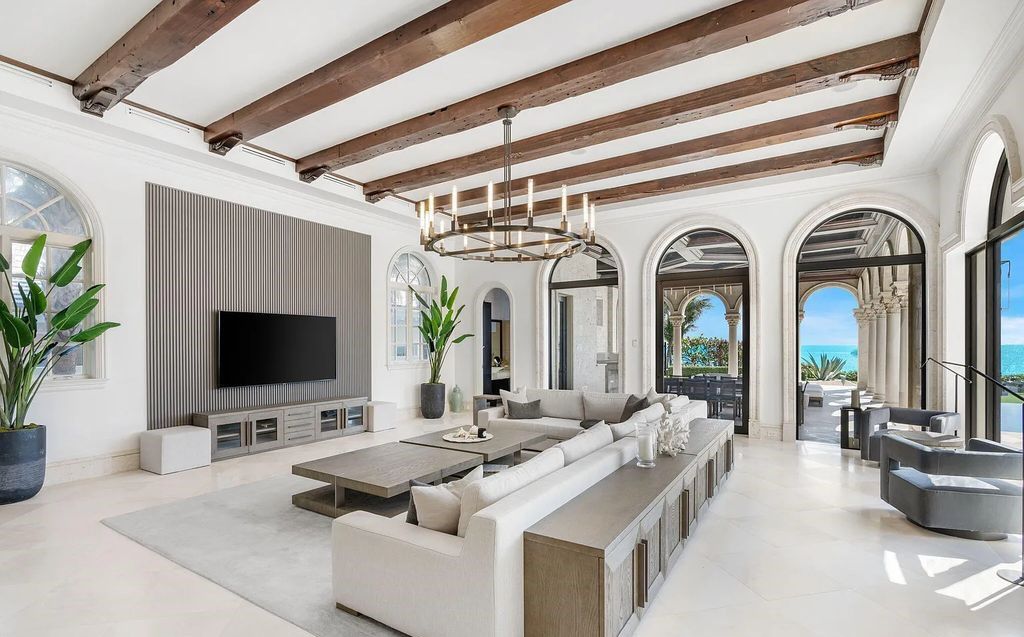 2325 S Ocean Blvd, Delray Beach, FL. A spectacular direct Oceanfront 9BR/13.7BA Estate, custom-built with commanding, unobstructed ocean views. The property boasts gorgeous detailing throughout, featuring palazzo-inspired compound, custom finishes, intricate marblework, and beautiful artisan millwork.