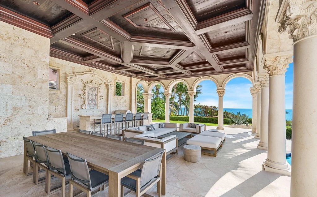 2325 S Ocean Blvd, Delray Beach, FL. A spectacular direct Oceanfront 9BR/13.7BA Estate, custom-built with commanding, unobstructed ocean views. The property boasts gorgeous detailing throughout, featuring palazzo-inspired compound, custom finishes, intricate marblework, and beautiful artisan millwork.