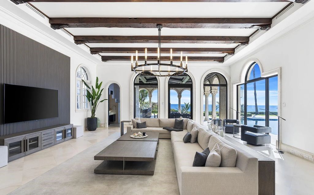 2325 S Ocean Blvd, Delray Beach, FL. A spectacular direct Oceanfront 9BR/13.7BA Estate, custom-built with commanding, unobstructed ocean views. The property boasts gorgeous detailing throughout, featuring palazzo-inspired compound, custom finishes, intricate marblework, and beautiful artisan millwork.