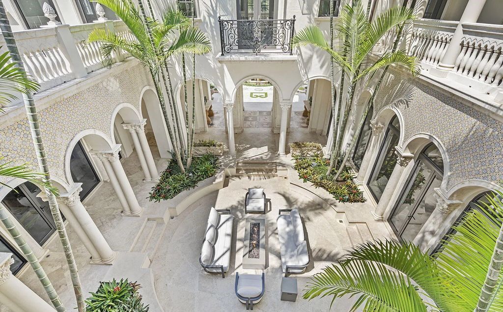 2325 S Ocean Blvd, Delray Beach, FL. A spectacular direct Oceanfront 9BR/13.7BA Estate, custom-built with commanding, unobstructed ocean views. The property boasts gorgeous detailing throughout, featuring palazzo-inspired compound, custom finishes, intricate marblework, and beautiful artisan millwork.