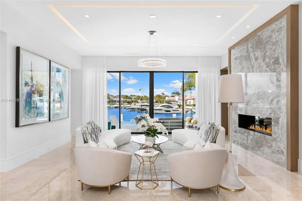 Welcome to 169 W. Key Palm Road in Boca Raton, a visionary display of architectural intrigue and soft contemporary design. The waterfront property is situated behind private gates in one of the most prominent residential communities in all of South Florida—Royal Palm Yacht & Country Club