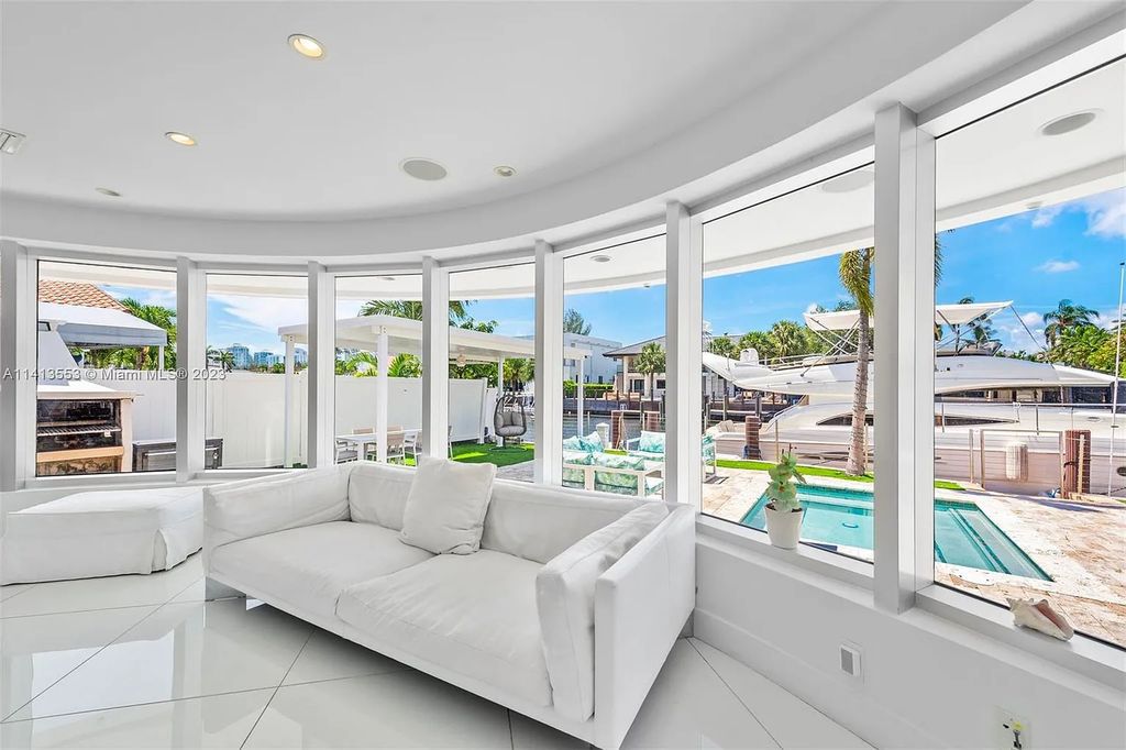 3344 NE 167th St, North Miami Beach, Florida. Sleekest, All Modern, Mint - Better than 2024 Design, BEST IN CLASS on the Market! 80 FT on Water with outfitted Dock for Ocean Access. Front Electric Gate and Elevator. Impact Windows, a NATURAL LIGHT MASTERPIECE