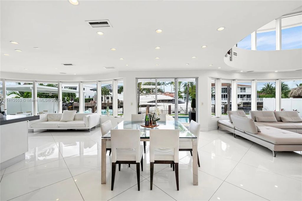 3344 NE 167th St, North Miami Beach, Florida. Sleekest, All Modern, Mint - Better than 2024 Design, BEST IN CLASS on the Market! 80 FT on Water with outfitted Dock for Ocean Access. Front Electric Gate and Elevator. Impact Windows, a NATURAL LIGHT MASTERPIECE