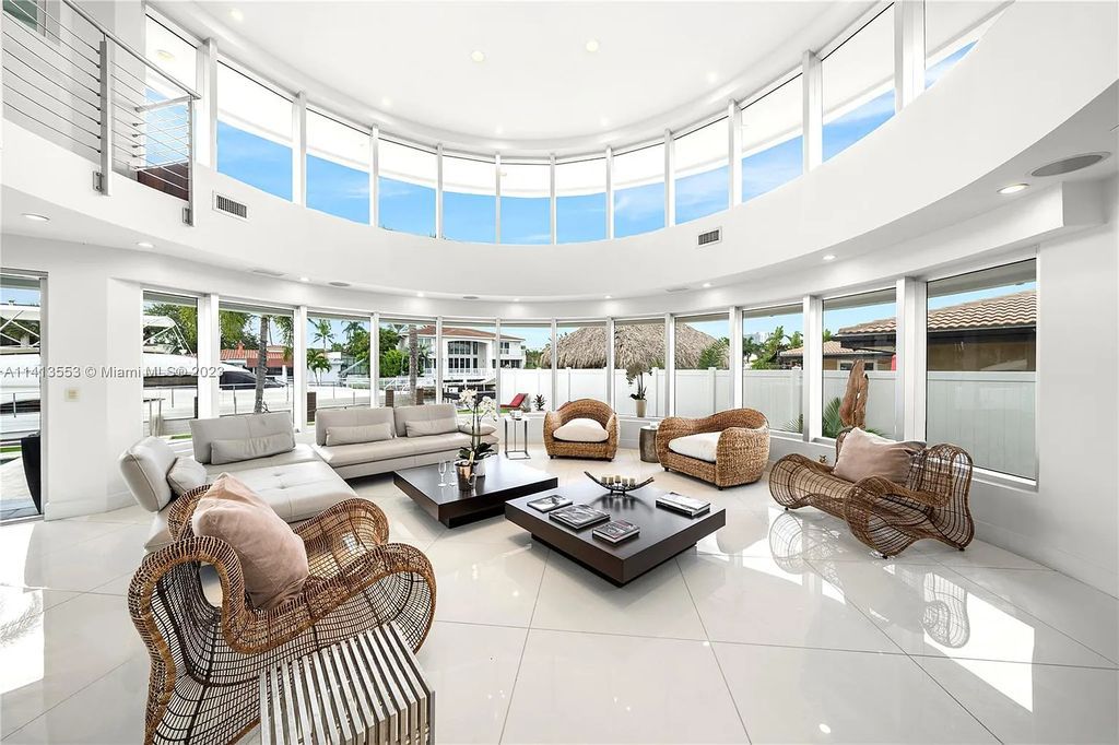 3344 NE 167th St, North Miami Beach, Florida. Sleekest, All Modern, Mint - Better than 2024 Design, BEST IN CLASS on the Market! 80 FT on Water with outfitted Dock for Ocean Access. Front Electric Gate and Elevator. Impact Windows, a NATURAL LIGHT MASTERPIECE