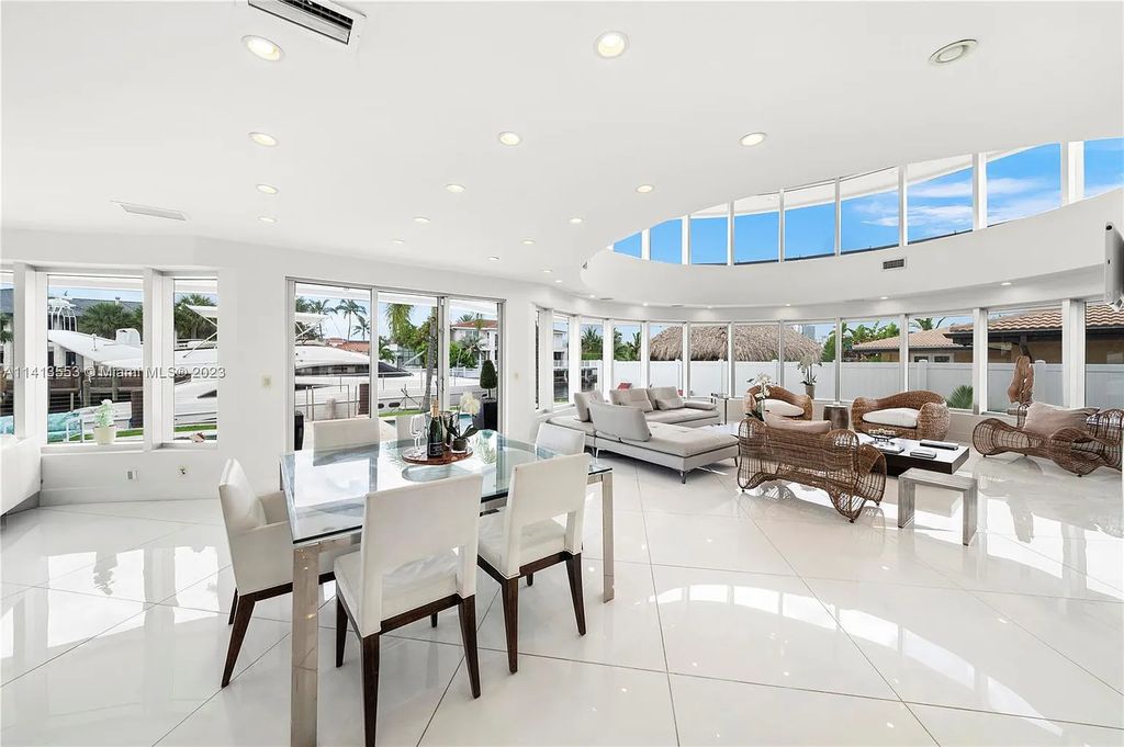 3344 NE 167th St, North Miami Beach, Florida. Sleekest, All Modern, Mint - Better than 2024 Design, BEST IN CLASS on the Market! 80 FT on Water with outfitted Dock for Ocean Access. Front Electric Gate and Elevator. Impact Windows, a NATURAL LIGHT MASTERPIECE