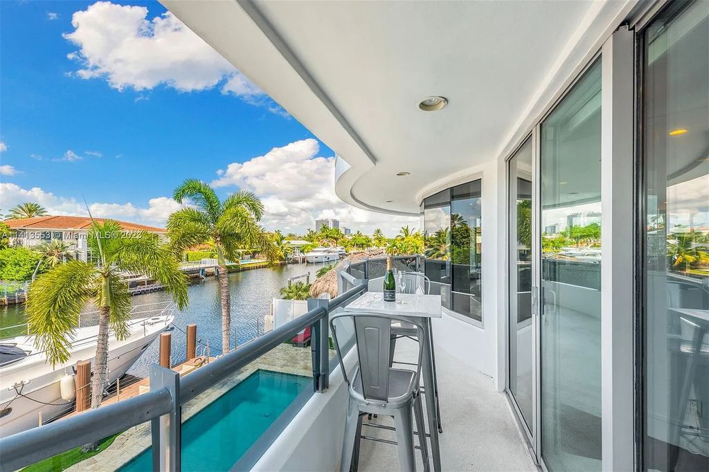 3344 NE 167th St, North Miami Beach, Florida. Sleekest, All Modern, Mint - Better than 2024 Design, BEST IN CLASS on the Market! 80 FT on Water with outfitted Dock for Ocean Access. Front Electric Gate and Elevator. Impact Windows, a NATURAL LIGHT MASTERPIECE