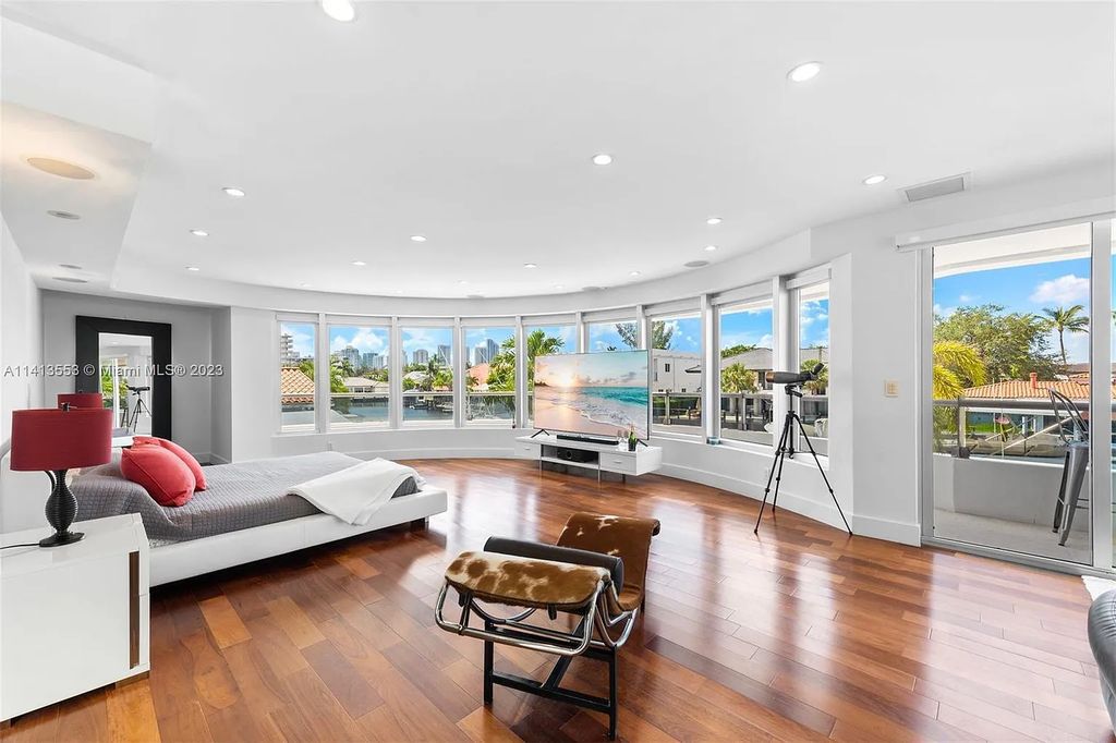 3344 NE 167th St, North Miami Beach, Florida. Sleekest, All Modern, Mint - Better than 2024 Design, BEST IN CLASS on the Market! 80 FT on Water with outfitted Dock for Ocean Access. Front Electric Gate and Elevator. Impact Windows, a NATURAL LIGHT MASTERPIECE