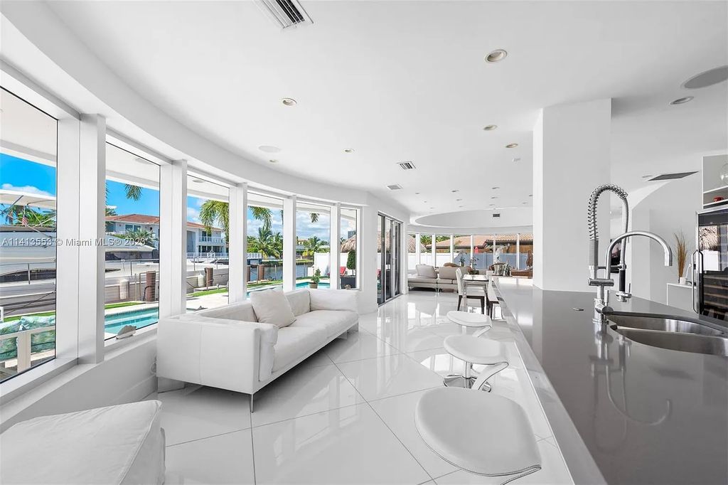 3344 NE 167th St, North Miami Beach, Florida. Sleekest, All Modern, Mint - Better than 2024 Design, BEST IN CLASS on the Market! 80 FT on Water with outfitted Dock for Ocean Access. Front Electric Gate and Elevator. Impact Windows, a NATURAL LIGHT MASTERPIECE