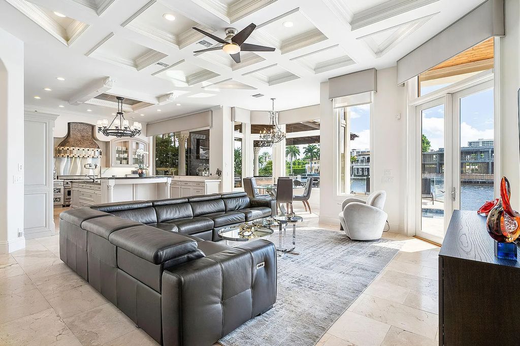 Live the ultimate waterfront dream at this exquisite estate in the prestigious Royal Palm Yacht & Country Club. With its private dock, resort-style pool, and awe-inspiring vistas, this 5-bedroom home offers the perfect blend of luxury and serenity.