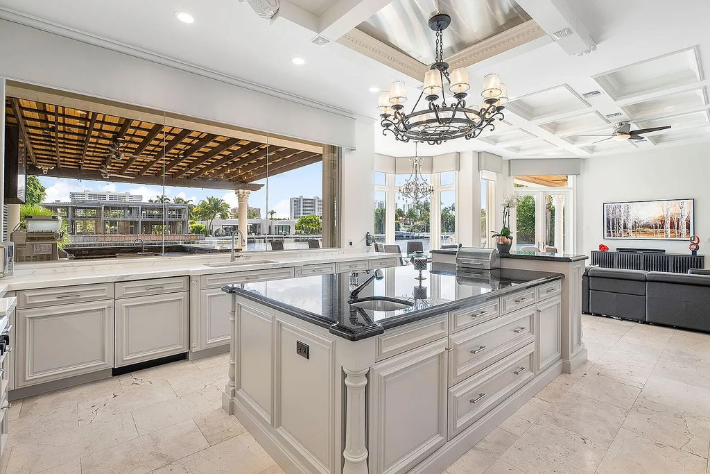 Live the ultimate waterfront dream at this exquisite estate in the prestigious Royal Palm Yacht & Country Club. With its private dock, resort-style pool, and awe-inspiring vistas, this 5-bedroom home offers the perfect blend of luxury and serenity.