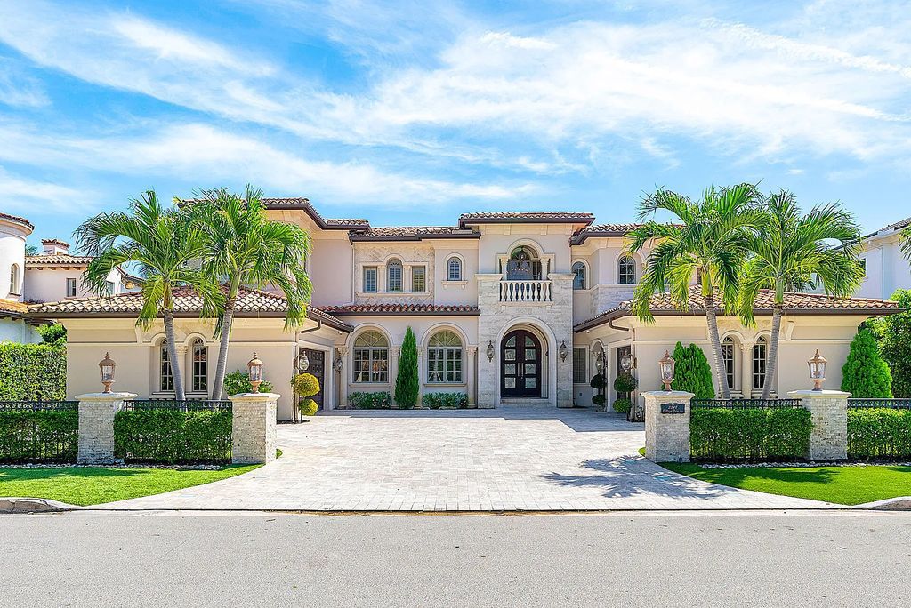 Live the ultimate waterfront dream at this exquisite estate in the prestigious Royal Palm Yacht & Country Club. With its private dock, resort-style pool, and awe-inspiring vistas, this 5-bedroom home offers the perfect blend of luxury and serenity.