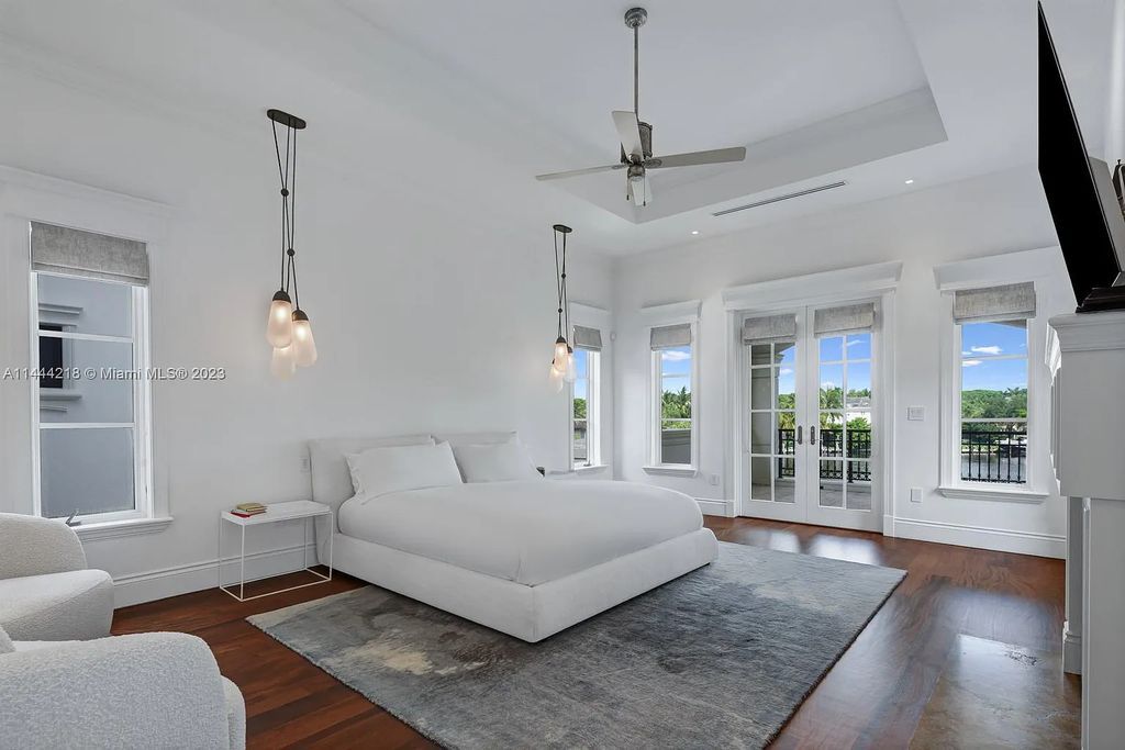 This architectural masterpiece, designed by famed architect Ramon Pacheco and remodeled in 2015, offers modern luxury living in the highly coveted & gated Coral Gables community of Old Cutler Bay. The grand foyer, sweeping staircase, and soaring ceilings welcome an abundance of natural light and elegance. Complete with an infinity-edge pool, plenty of covered terraces, and beautiful water views.