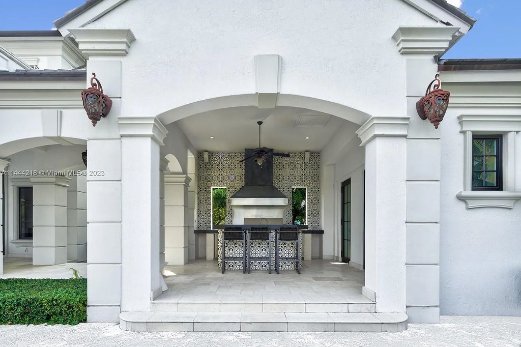 This architectural masterpiece, designed by famed architect Ramon Pacheco and remodeled in 2015, offers modern luxury living in the highly coveted & gated Coral Gables community of Old Cutler Bay. The grand foyer, sweeping staircase, and soaring ceilings welcome an abundance of natural light and elegance. Complete with an infinity-edge pool, plenty of covered terraces, and beautiful water views.