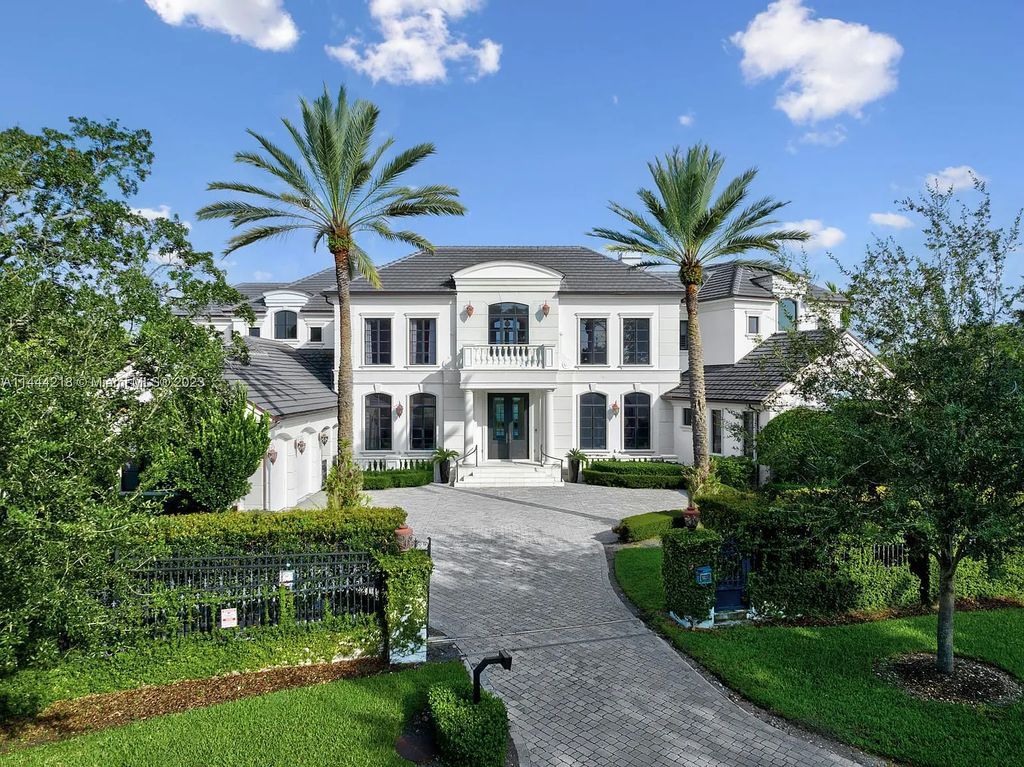 This architectural masterpiece, designed by famed architect Ramon Pacheco and remodeled in 2015, offers modern luxury living in the highly coveted & gated Coral Gables community of Old Cutler Bay. The grand foyer, sweeping staircase, and soaring ceilings welcome an abundance of natural light and elegance. Complete with an infinity-edge pool, plenty of covered terraces, and beautiful water views.