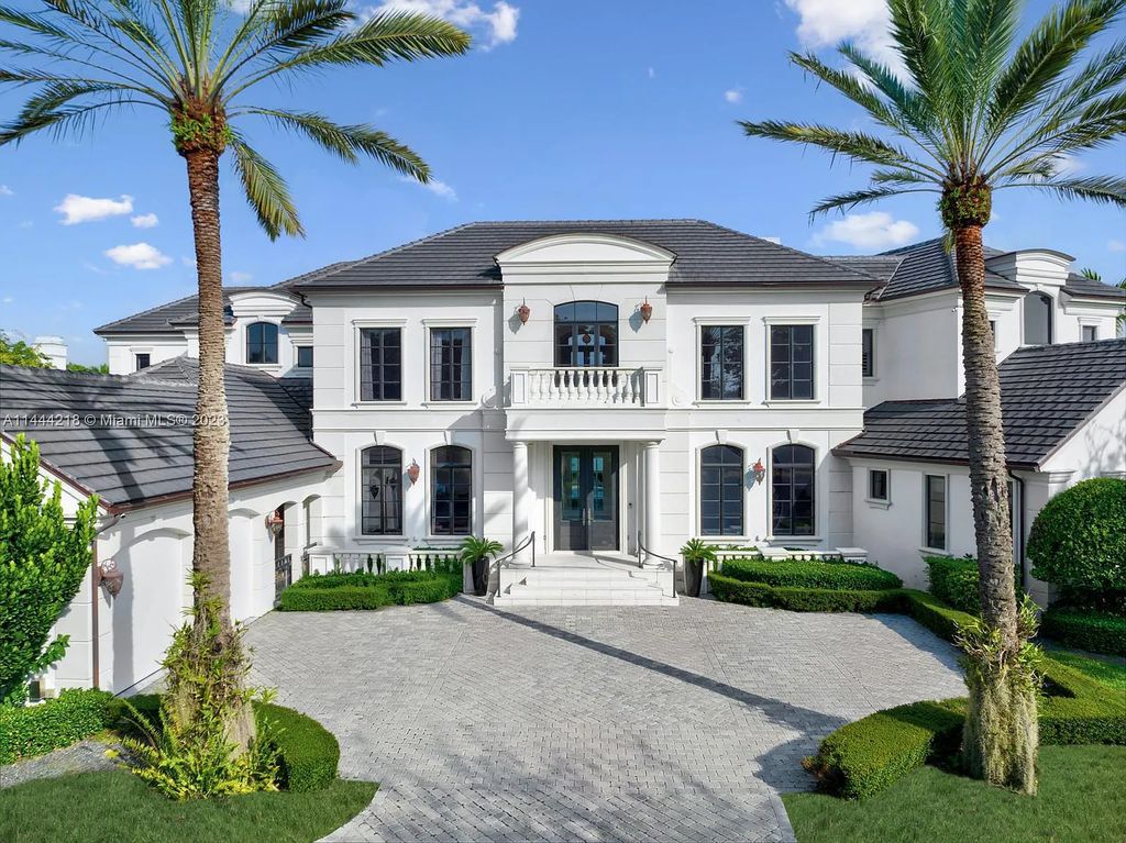 This architectural masterpiece, designed by famed architect Ramon Pacheco and remodeled in 2015, offers modern luxury living in the highly coveted & gated Coral Gables community of Old Cutler Bay. The grand foyer, sweeping staircase, and soaring ceilings welcome an abundance of natural light and elegance. Complete with an infinity-edge pool, plenty of covered terraces, and beautiful water views.