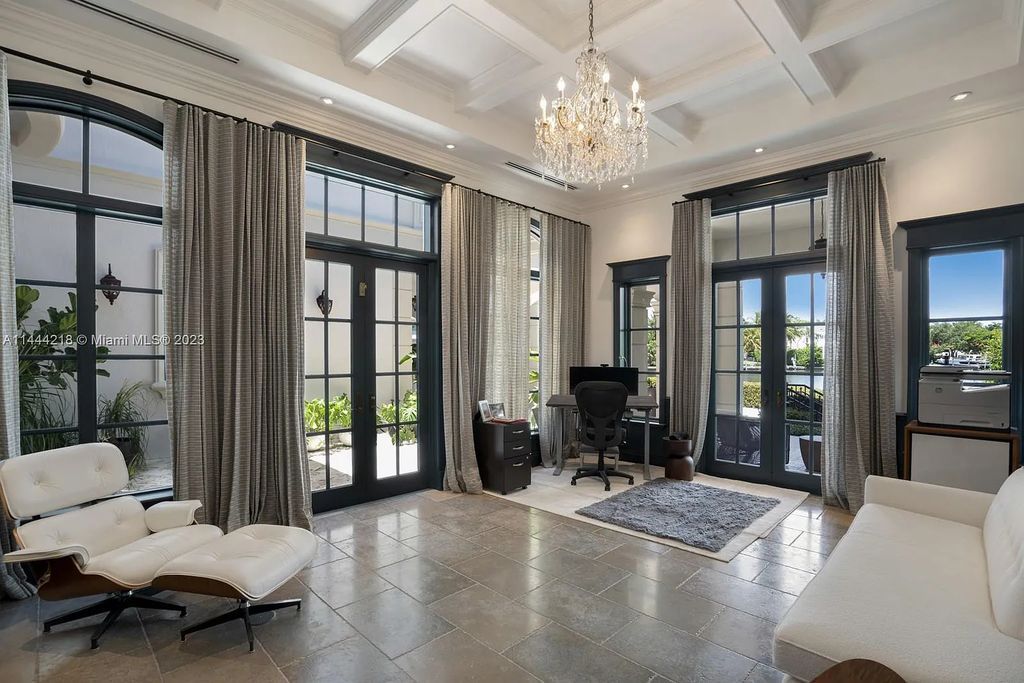 This architectural masterpiece, designed by famed architect Ramon Pacheco and remodeled in 2015, offers modern luxury living in the highly coveted & gated Coral Gables community of Old Cutler Bay. The grand foyer, sweeping staircase, and soaring ceilings welcome an abundance of natural light and elegance. Complete with an infinity-edge pool, plenty of covered terraces, and beautiful water views.