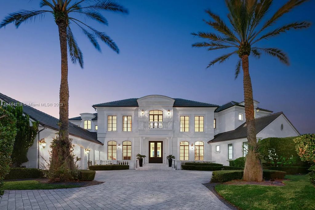 This architectural masterpiece, designed by famed architect Ramon Pacheco and remodeled in 2015, offers modern luxury living in the highly coveted & gated Coral Gables community of Old Cutler Bay. The grand foyer, sweeping staircase, and soaring ceilings welcome an abundance of natural light and elegance. Complete with an infinity-edge pool, plenty of covered terraces, and beautiful water views.