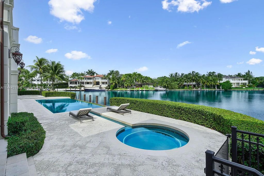 This architectural masterpiece, designed by famed architect Ramon Pacheco and remodeled in 2015, offers modern luxury living in the highly coveted & gated Coral Gables community of Old Cutler Bay. The grand foyer, sweeping staircase, and soaring ceilings welcome an abundance of natural light and elegance. Complete with an infinity-edge pool, plenty of covered terraces, and beautiful water views.