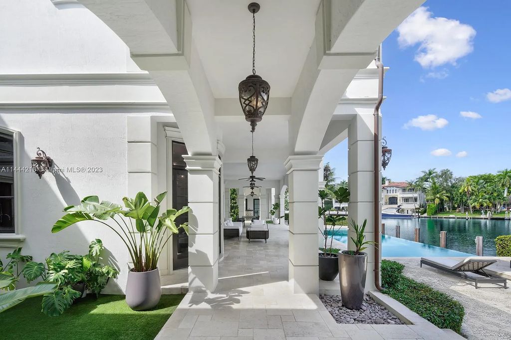 This architectural masterpiece, designed by famed architect Ramon Pacheco and remodeled in 2015, offers modern luxury living in the highly coveted & gated Coral Gables community of Old Cutler Bay. The grand foyer, sweeping staircase, and soaring ceilings welcome an abundance of natural light and elegance. Complete with an infinity-edge pool, plenty of covered terraces, and beautiful water views.