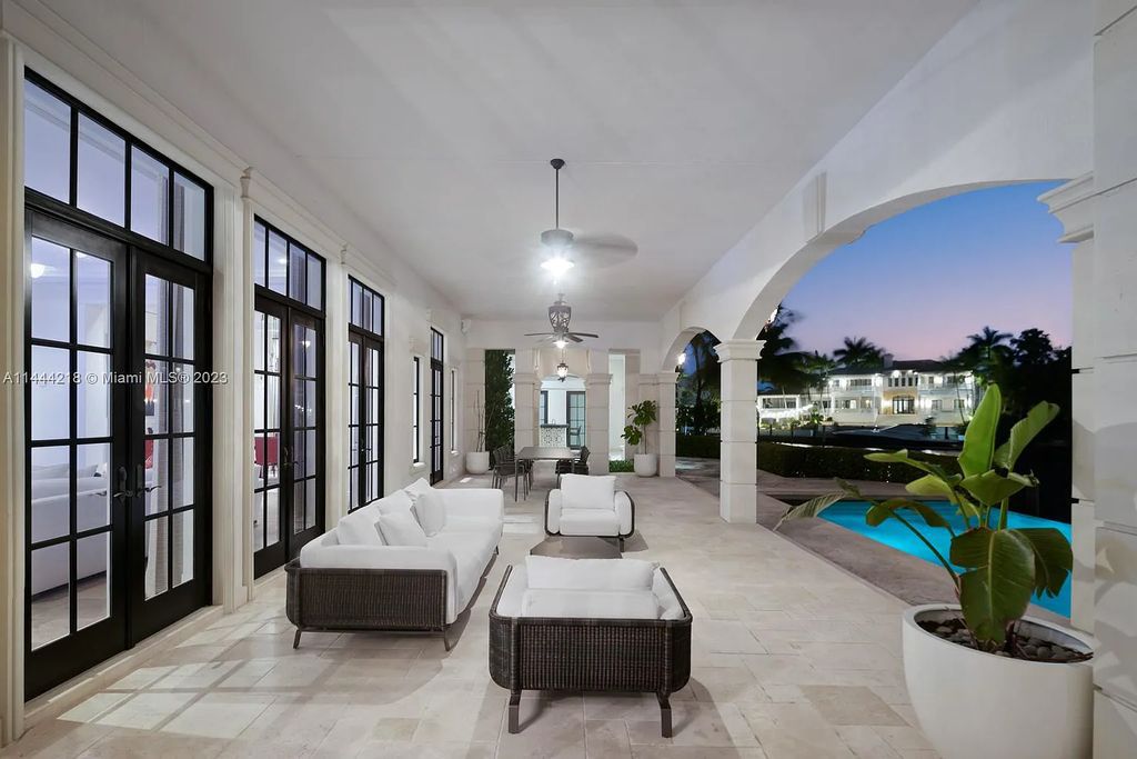 This architectural masterpiece, designed by famed architect Ramon Pacheco and remodeled in 2015, offers modern luxury living in the highly coveted & gated Coral Gables community of Old Cutler Bay. The grand foyer, sweeping staircase, and soaring ceilings welcome an abundance of natural light and elegance. Complete with an infinity-edge pool, plenty of covered terraces, and beautiful water views.