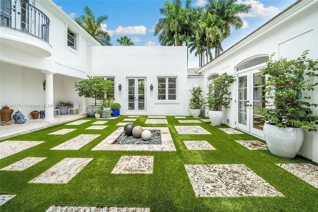 Fully renovated 8-bedroom, 8.5-bathroom estate on prestigious North Bay Road. Enjoy spectacular views of Downtown Miami and Biscayne Bay from the manicured grounds, complete with a private dock, pool, hot tub, cold plunge, summer kitchen, inviting driveway, and abundant courtyards. Boaters welcome with 139 feet on the water.