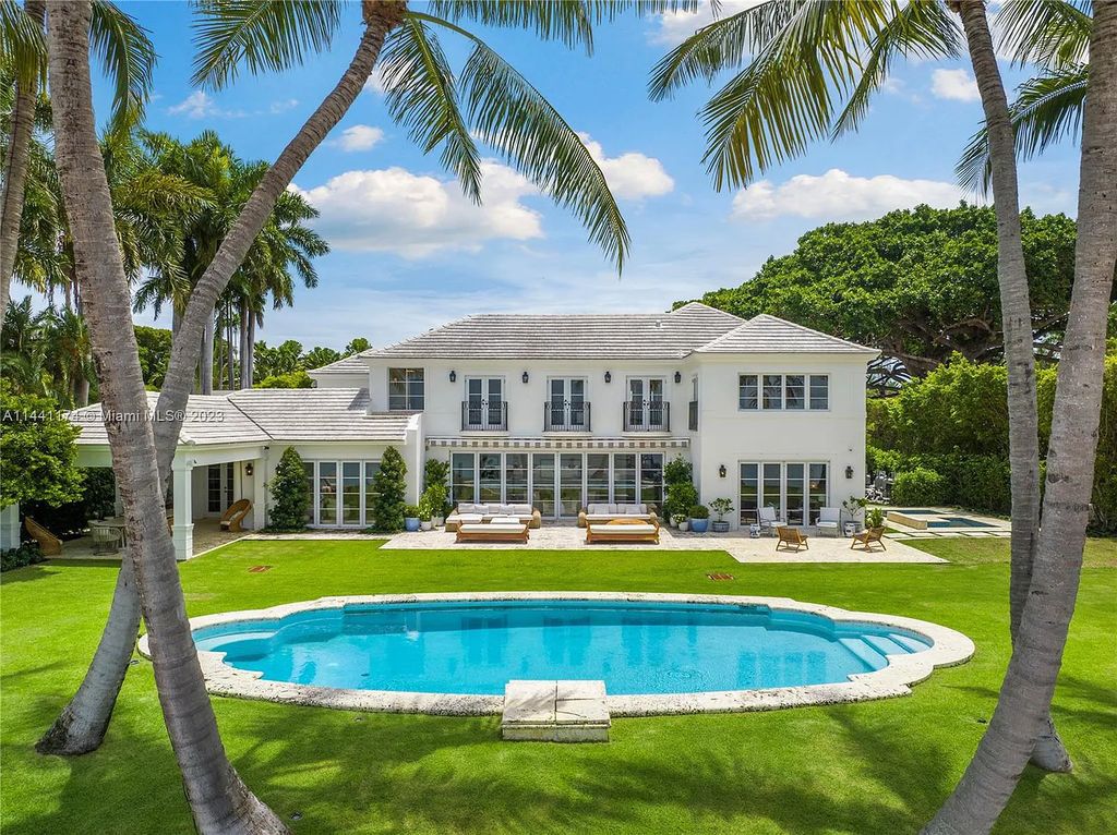 Fully renovated 8-bedroom, 8.5-bathroom estate on prestigious North Bay Road. Enjoy spectacular views of Downtown Miami and Biscayne Bay from the manicured grounds, complete with a private dock, pool, hot tub, cold plunge, summer kitchen, inviting driveway, and abundant courtyards. Boaters welcome with 139 feet on the water.