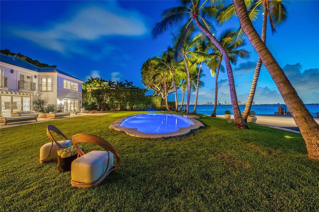 Fully renovated 8-bedroom, 8.5-bathroom estate on prestigious North Bay Road. Enjoy spectacular views of Downtown Miami and Biscayne Bay from the manicured grounds, complete with a private dock, pool, hot tub, cold plunge, summer kitchen, inviting driveway, and abundant courtyards. Boaters welcome with 139 feet on the water.