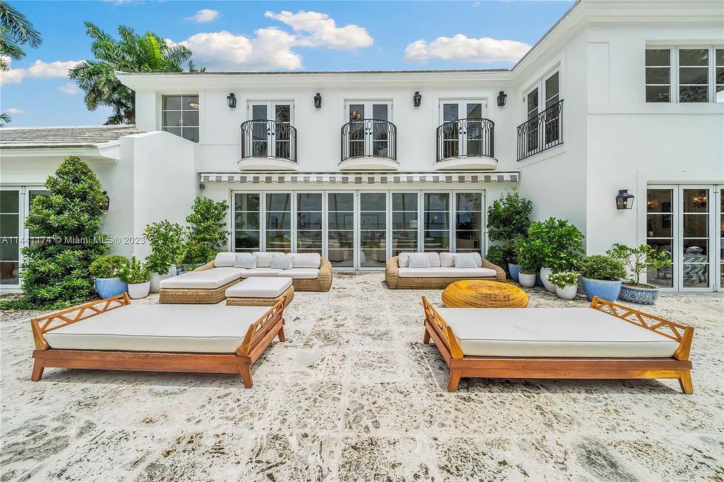 Fully renovated 8-bedroom, 8.5-bathroom estate on prestigious North Bay Road. Enjoy spectacular views of Downtown Miami and Biscayne Bay from the manicured grounds, complete with a private dock, pool, hot tub, cold plunge, summer kitchen, inviting driveway, and abundant courtyards. Boaters welcome with 139 feet on the water.