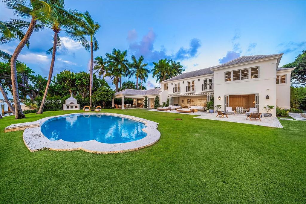 Fully renovated 8-bedroom, 8.5-bathroom estate on prestigious North Bay Road. Enjoy spectacular views of Downtown Miami and Biscayne Bay from the manicured grounds, complete with a private dock, pool, hot tub, cold plunge, summer kitchen, inviting driveway, and abundant courtyards. Boaters welcome with 139 feet on the water.