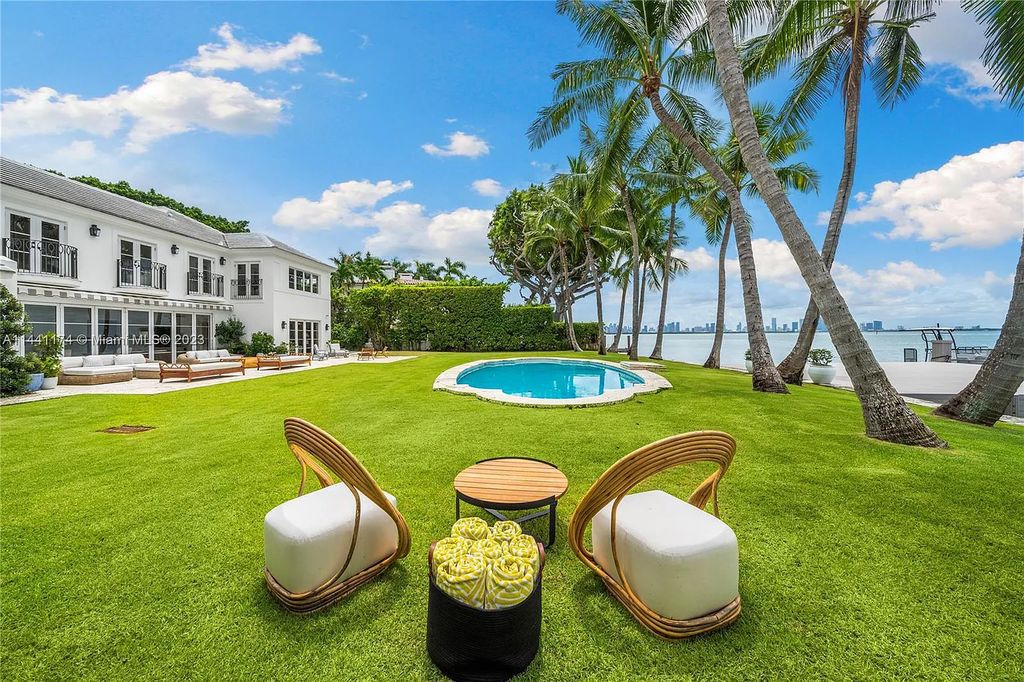 Fully renovated 8-bedroom, 8.5-bathroom estate on prestigious North Bay Road. Enjoy spectacular views of Downtown Miami and Biscayne Bay from the manicured grounds, complete with a private dock, pool, hot tub, cold plunge, summer kitchen, inviting driveway, and abundant courtyards. Boaters welcome with 139 feet on the water.