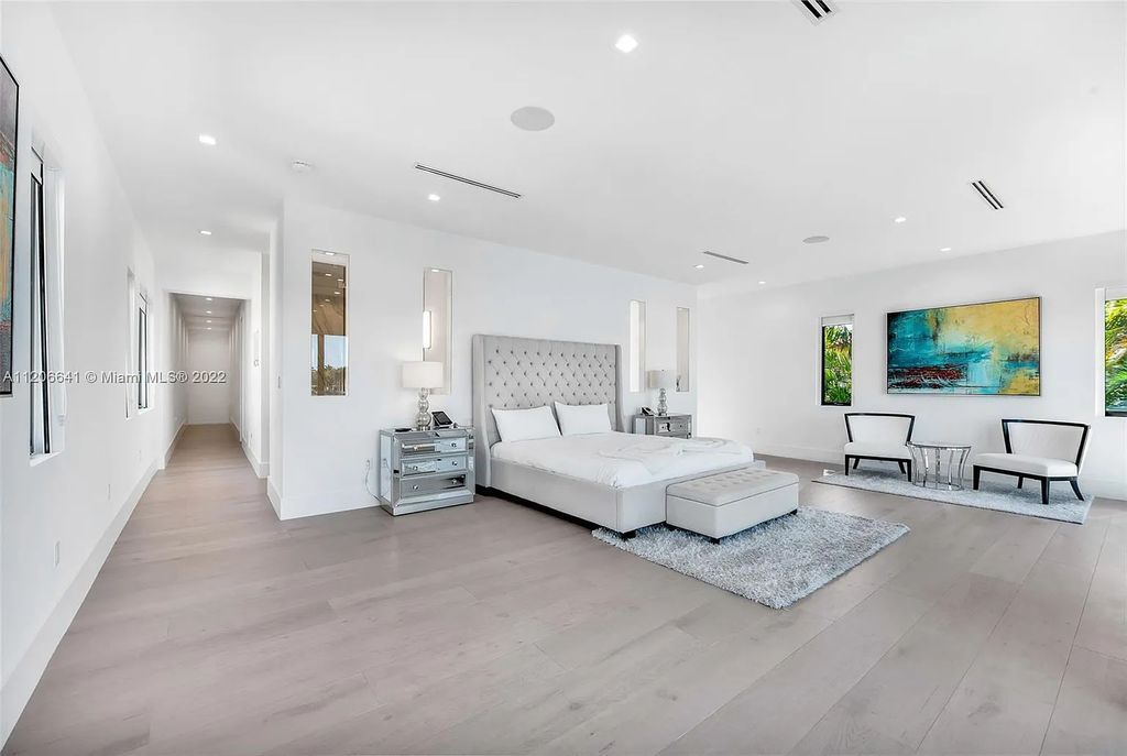 This 10,114 SF estate boasts an enviable sophisticated lifestyle complete with a guesthouse, 3-parking garages, gym, office, master suite with balcony, and more!