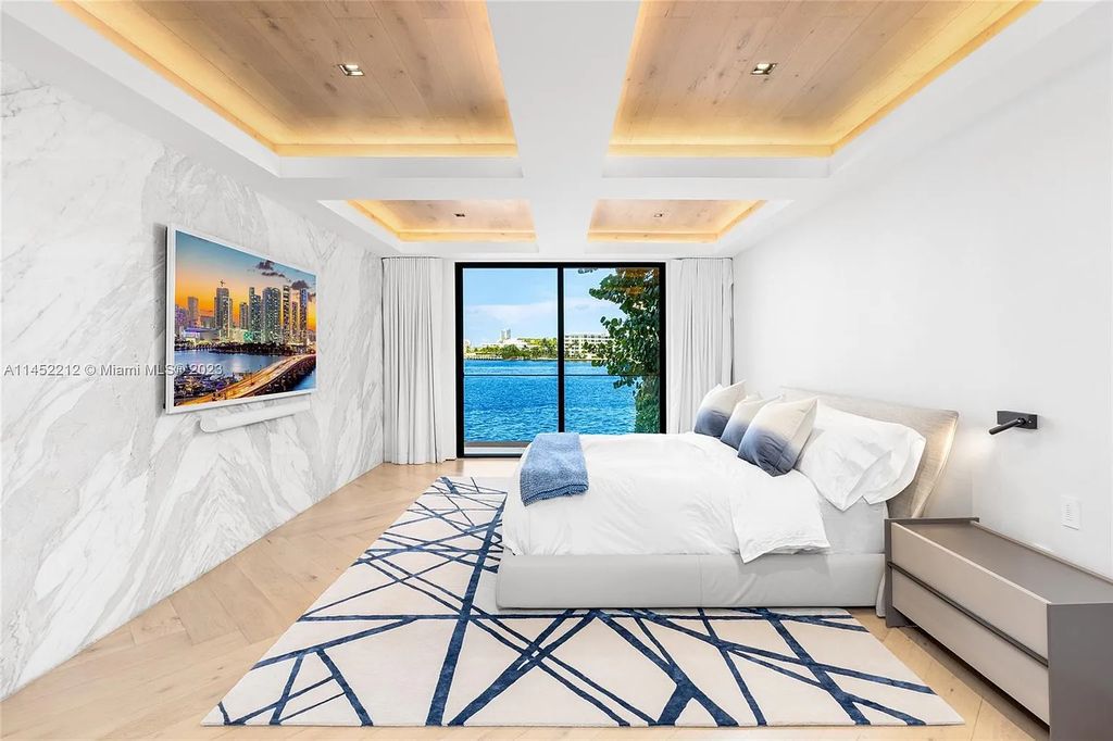 Experience sheer bliss in this contemporary masterpiece on the Venetian Islands. Completed in 2021, this waterfront estate features exquisite details, including vibrant marbles, a spacious open-plan living area, a stylish cocktail bar, and a chef's dream kitchen.