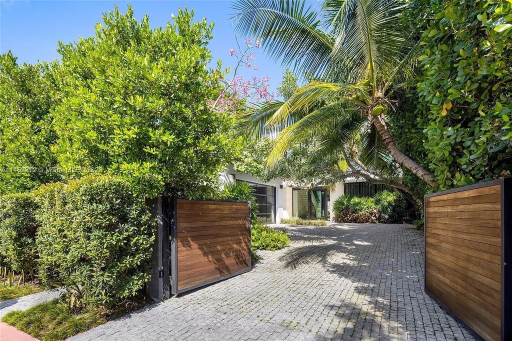 Experience sheer bliss in this contemporary masterpiece on the Venetian Islands. Completed in 2021, this waterfront estate features exquisite details, including vibrant marbles, a spacious open-plan living area, a stylish cocktail bar, and a chef's dream kitchen.