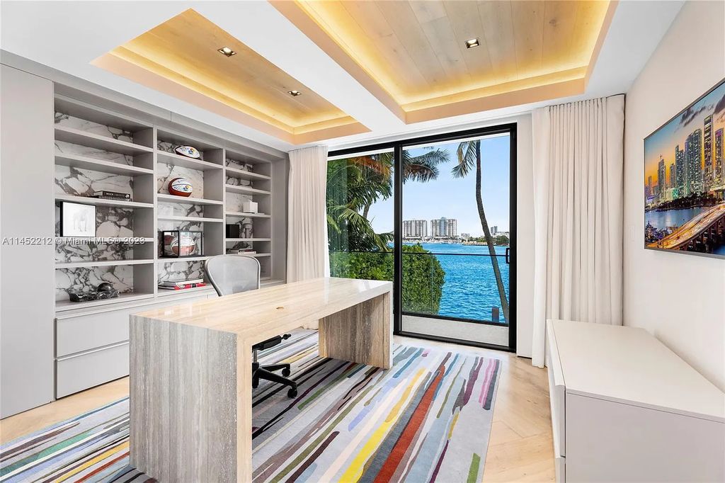 Experience sheer bliss in this contemporary masterpiece on the Venetian Islands. Completed in 2021, this waterfront estate features exquisite details, including vibrant marbles, a spacious open-plan living area, a stylish cocktail bar, and a chef's dream kitchen.