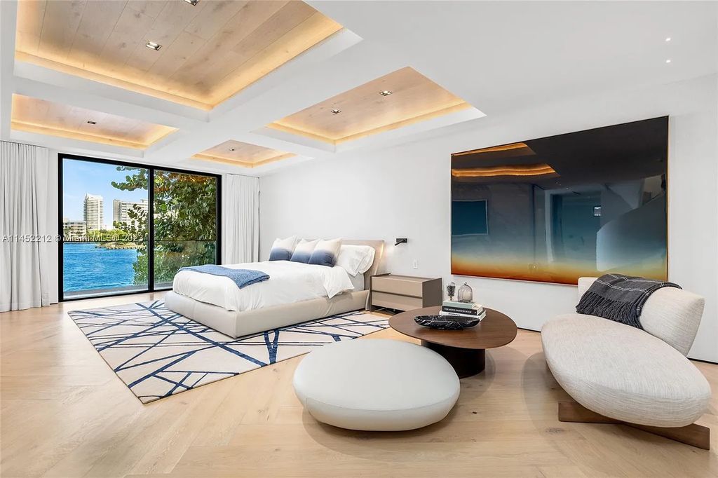 Experience sheer bliss in this contemporary masterpiece on the Venetian Islands. Completed in 2021, this waterfront estate features exquisite details, including vibrant marbles, a spacious open-plan living area, a stylish cocktail bar, and a chef's dream kitchen.