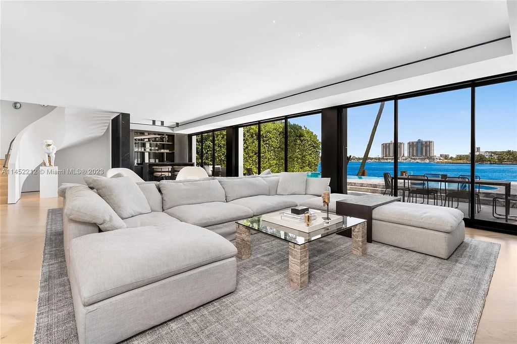 Experience sheer bliss in this contemporary masterpiece on the Venetian Islands. Completed in 2021, this waterfront estate features exquisite details, including vibrant marbles, a spacious open-plan living area, a stylish cocktail bar, and a chef's dream kitchen.