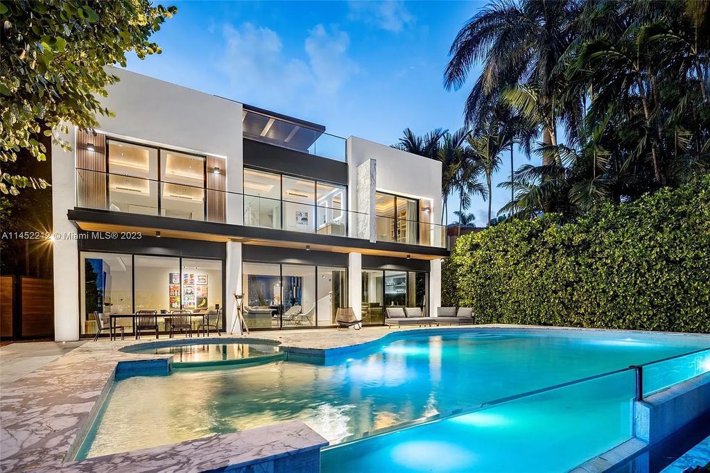 Experience sheer bliss in this contemporary masterpiece on the Venetian Islands. Completed in 2021, this waterfront estate features exquisite details, including vibrant marbles, a spacious open-plan living area, a stylish cocktail bar, and a chef's dream kitchen.