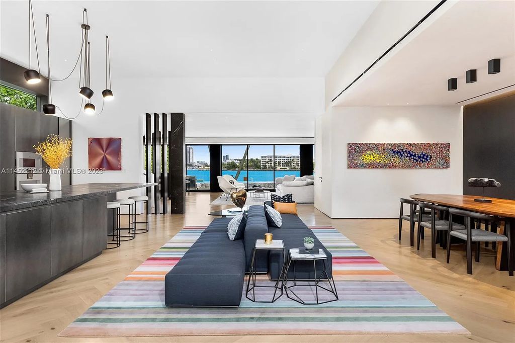 Experience sheer bliss in this contemporary masterpiece on the Venetian Islands. Completed in 2021, this waterfront estate features exquisite details, including vibrant marbles, a spacious open-plan living area, a stylish cocktail bar, and a chef's dream kitchen.