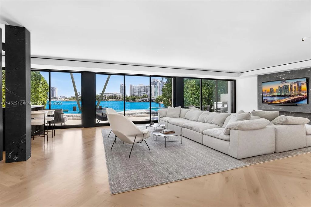 Experience sheer bliss in this contemporary masterpiece on the Venetian Islands. Completed in 2021, this waterfront estate features exquisite details, including vibrant marbles, a spacious open-plan living area, a stylish cocktail bar, and a chef's dream kitchen.