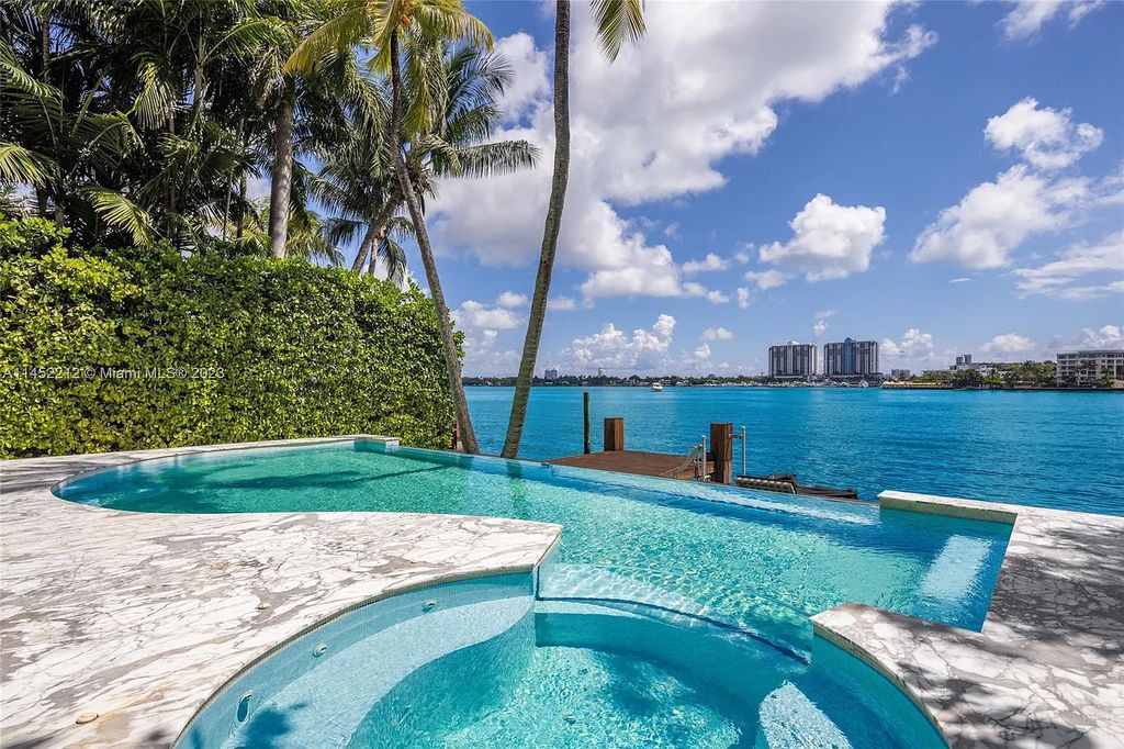 Experience sheer bliss in this contemporary masterpiece on the Venetian Islands. Completed in 2021, this waterfront estate features exquisite details, including vibrant marbles, a spacious open-plan living area, a stylish cocktail bar, and a chef's dream kitchen.